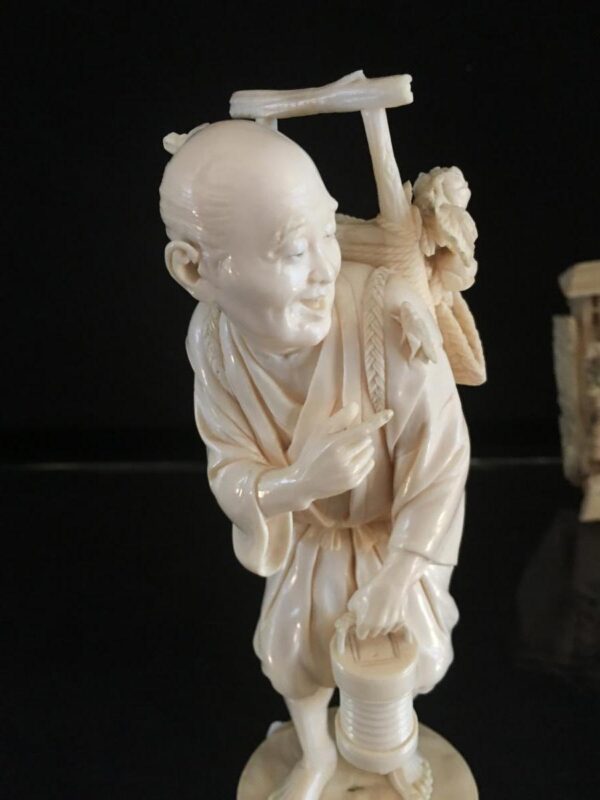 Rare 19th Century Ivory Okimono representing a Peasant - Image 2